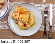 Italian casserole made from filo dough, lightly salted salmon and broccoli cabbage. Стоковое фото, фотограф Яков Филимонов / Фотобанк Лори