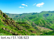 Picturesque landscape of green mountain slope with rock formations. North Caucasus (2024 год). Стоковое фото, фотограф Константин Лабунский / Фотобанк Лори