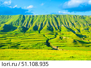 Incredibly beautiful view of the ancient green slope of the mountain plateau with erosion and natural terraces of geological deposits. North Caucasus. Стоковое фото, фотограф Константин Лабунский / Фотобанк Лори