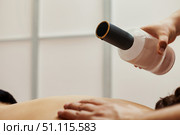 Therapeutic Touch Applying Massage Oil in Spa Setting for Rejuvenation. Стоковое фото, фотограф Aleksandr Golubev / Фотобанк Лори