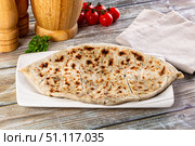 Turkish Kutab staffed green herbs. Стоковое фото, фотограф Андрей Старостин / Фотобанк Лори