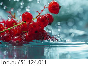 Fresh redcurrants splashing into water with refreshing drops. Стоковое AI-изображение, AI-художник Иван Рябоконь / Фотобанк Лори