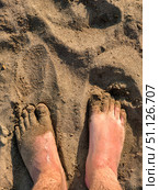 Male feet in the sand on the beach. Стоковое фото, фотограф Назар Дармодехин / Фотобанк Лори