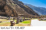 Ruins of an ancient fortress Ollantaytambo in the Sacred Valley of the Incas. Stone terraces on the mountainside. Archaeological fragments. Walking path. Peru. Araqhama. Plaza of Manyaraki. Стоковое фото, фотограф Вера Ивановна Кубарева / Фотобанк Лори