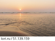 Sunset on Mandrem beach in Goa, India. (2018 год). Стоковое фото, фотограф Емельянов Евгений Викторович / Фотобанк Лори