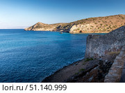 Spinalonga fortress on a clear sunny day. The ruins of leprosolium. (2019 год). Стоковое фото, фотограф Емельянов Евгений Викторович / Фотобанк Лори