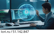 A young man develops software in a modern office environment with multiple screens displaying complex data. Стоковое AI-видео, аниматор Данила Большаков / Фотобанк Лори