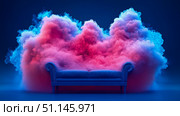 Stylish blue sofa enveloped in dramatic swirl of vibrant pink and electric blue smoke, creating surreal and dreamy interior scene with mysterious ambiance. Стоковое AI-изображение, AI-художник Данила Большаков / Фотобанк Лори