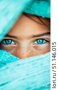 Striking Close-up Portrait of Intense Blue Eyes and Freckles Revealed Through Soft Aqua-Teal Veil. Стоковое AI-изображение, AI-художник Данила Большаков / Фотобанк Лори