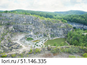 Photography of an open pit development, top view. Quarry mining of minerals and minerals, mines and industry. Стоковое фото, фотограф Наталия Кирсанова / Фотобанк Лори