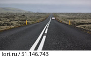 Highway through Iceland landscape at foggy day. Стоковое видео, видеограф Анастасия Золотницкая / Фотобанк Лори