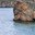Baikal Lake in summer. Girls travel around Small Sea bay on SUP boards and explore beautiful grottoes in rocks of Olkhon Island. Active seaside recreation in summer holidays. Стоковое фото, фотограф Виктория Катьянова / Фотобанк Лори