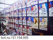Moscow, Russia - March 21, 2023: Moscow Planetarium. Photos of Russian cosmonauts. Редакционное фото, фотограф Наталия Кирсанова / Фотобанк Лори