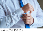 Men's hands correct shirt with cufflinks. Стоковое фото, фотограф Наталия Кирсанова / Фотобанк Лори