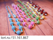 Beads made of felted wool, handmade. Creativity and hobbies. Стоковое фото, фотограф Наталия Кирсанова / Фотобанк Лори