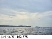 ISTANBUL, TURKEY - NOVEMBER 23, 2021: The Bosphorus Strait and the Asian side of the city. Редакционное фото, фотограф Наталия Кирсанова / Фотобанк Лори
