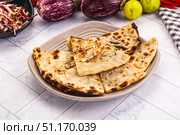 Indian stuffed potato bread Paratha. Стоковое фото, фотограф Андрей Старостин / Фотобанк Лори