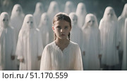 Little girl stands fearlessly amidst a gathering of ghostly figures, observing their presence with intrigue. Стоковое AI-видео, аниматор Данила Большаков / Фотобанк Лори