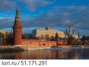 Vodovzvodnaya and Annunciation Towers of the Kremlin Wall, the Grand Kremlin Palace and the Kremlin Embankment of the Moskva River, Moscow, Russia. Стоковое фото, фотограф Ula Ulachka / Фотобанк Лори