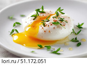 Poached egg on a white background. Close up of Eggs Benedict with liquid egg yolk running out. healthy breakfast. Close-up, macro. High key, studio. Delicious eggs served on a plate with fresh herbs. Стоковое AI-изображение, AI-художник Марина Демидюк / Фотобанк Лори