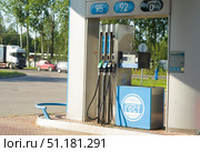 St.Petersburg,Russia- August 4,2025:Gas station with gasoline dispensers of three types of gasoline. Редакционное фото, фотограф Андрей Митин / Фотобанк Лори