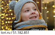Portrait of cute smiling child at Christmas market. Стоковое фото, фотограф Маргарита Кирьякова / Фотобанк Лори