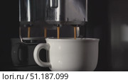making a drink in a coffee machine, espresso in a white cup. Стоковое видео, видеограф ~✿Eлена Челышева(Кочина)✿~ / Фотобанк Лори