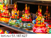 Saint-Petersburg, Russia - July 13th, 2018. Traditional handicraft wooden souvenirs at street gift store. Редакционное фото, фотограф Denis Vostrikov / Фотобанк Лори