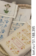 Enhance your entertaining experience with these exquisitely embroidered cocktail napkins.  Crafted from the finest quality linen, each napkin showcases finely stitched palm trees and is bordered with a delicate Amour pulled thread design. Стоковое видео, видеограф Zita Khasanova / Фотобанк Лори