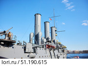Saint Petersburg, Russia - May 25, 2021: The famous Cruiser Aurora. Symbol of the beginning of the revolution in the Russian Empire. Редакционное фото, фотограф Наталия Кирсанова / Фотобанк Лори