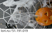 Pumpkin and black spider on a white web with flashing lights, Halloween holiday concept. Стоковое видео, видеограф Катерина Белякина / Фотобанк Лори