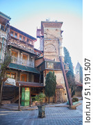 Tbilisi, Georgia - 04 January, 2023: Old City center. The famous puppet theater of Rezo Gabriadze. Редакционное фото, фотограф Наталия Кирсанова / Фотобанк Лори