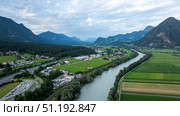 Inn river meandering through green valley in the Austrian Alps near Wiesing, Tyrol. Стоковое фото, фотограф Данил Руденко / Фотобанк Лори