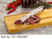 Spanish dry Fuet sausages snack. Стоковое фото, фотограф Андрей Старостин / Фотобанк Лори