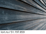 Modern brown wood plank texture. Fiber cement siding. Exterior of composite wall. Plastic material is eco-friendly polymer panels in rows. Wooden grain surface. Hollow WPC boards. Dark oak color. PE. Стоковое AI-изображение, AI-художник Марина Демидюк / Фотобанк Лори