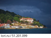 ISTANBUL, TURKEY - NOVEMBER 26, 2021: Building on the Princes' Islands, view from the ship. The Sea of Marmara. Редакционное фото, фотограф Наталия Кирсанова / Фотобанк Лори