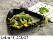 Raw gherkin cucumbers in the bowl. Стоковое фото, фотограф Андрей Старостин / Фотобанк Лори