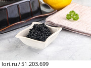 black sturgeon caviar in the bowl. Стоковое фото, фотограф Андрей Старостин / Фотобанк Лори