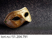 Festive, colorful Mardi Gras or carnivale mask on golden background. Venetian masks. Стоковое фото, фотограф Ирина Буракова / Фотобанк Лори
