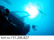 Exploring Deep Blue Mystery of a Sunken Ship in the Red Sea. Стоковое фото, фотограф Aleksandr Golubev / Фотобанк Лори
