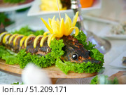 The food in the restaurant fish sturgeon on the tray. Стоковое фото, фотограф Наталия Кирсанова / Фотобанк Лори
