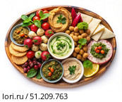 Top View of a Lebanese Mezze Platter With Hummus, Baba Ghanoush, and Pita Bread. Generative AI. Стоковое AI-изображение, AI-художник Roman Zavorotny / Фотобанк Лори