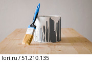 A brush for painting and a can of paint. Стоковое фото, фотограф Енваев Андрей / Фотобанк Лори