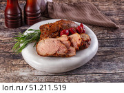 Baked pork sirloin with cornus. Стоковое фото, фотограф Андрей Старостин / Фотобанк Лори
