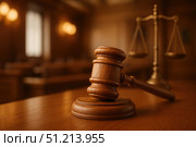 A Close-Up of a Wooden Gavel and Scales of Justice in a Courthouse Setting, Symbolizing Law and Order in a Judicial Environment. Стоковое AI-изображение, AI-художник Башкирова Анна / Фотобанк Лори