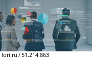A group of three business professionals discusses important data insights and visual trends in a contemporary office environment. Стоковое AI-видео, аниматор Данила Большаков / Фотобанк Лори