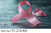 Join the campaign promoting breast cancer awareness through a pink ribbon, encouraging community support and education throughout October. Стоковое AI-видео, аниматор Данила Большаков / Фотобанк Лори