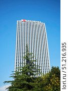Batumi, Georgia. - July 04, 2023: A tall building with modern architecture in the center of Batumi, where the Marriott hotel is located. Редакционное фото, фотограф Наталия Кирсанова / Фотобанк Лори