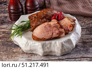 Baked pork sirloin with cornus. Стоковое фото, фотограф Андрей Старостин / Фотобанк Лори