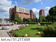 Moscow, Russia - Aug 10. 2025. The square with the clock in MZhK microdistrict in Zelenograd. Редакционное фото, фотограф Володина Ольга / Фотобанк Лори